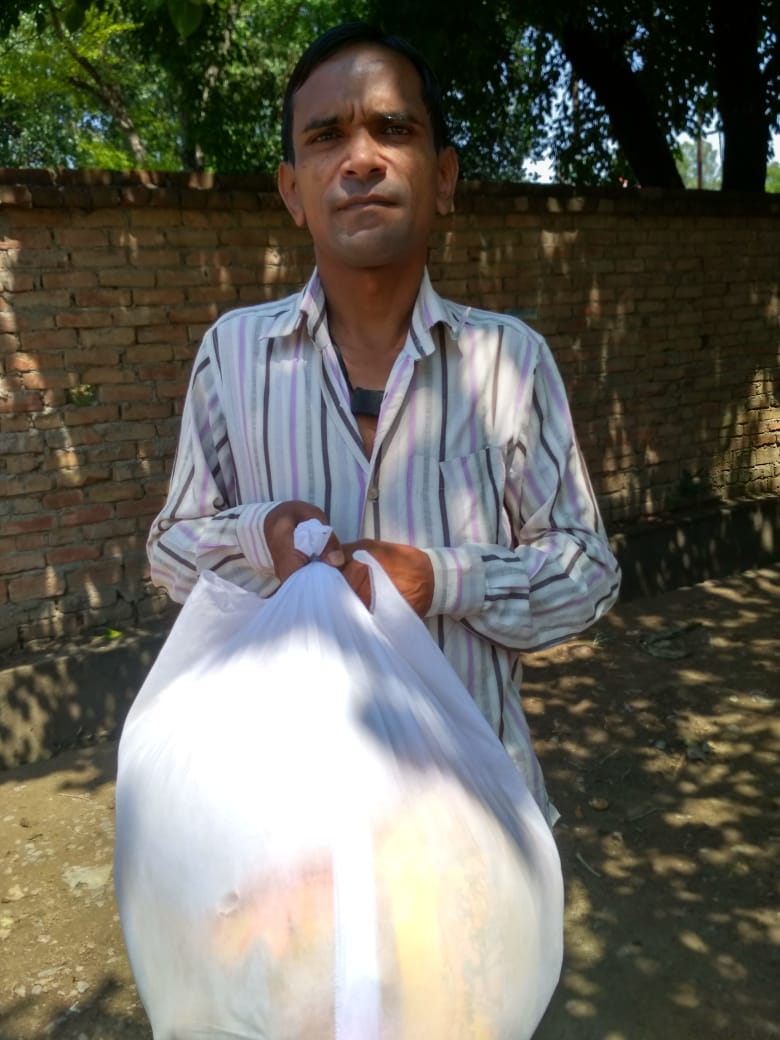 Ajay Sahini with ration for distribution